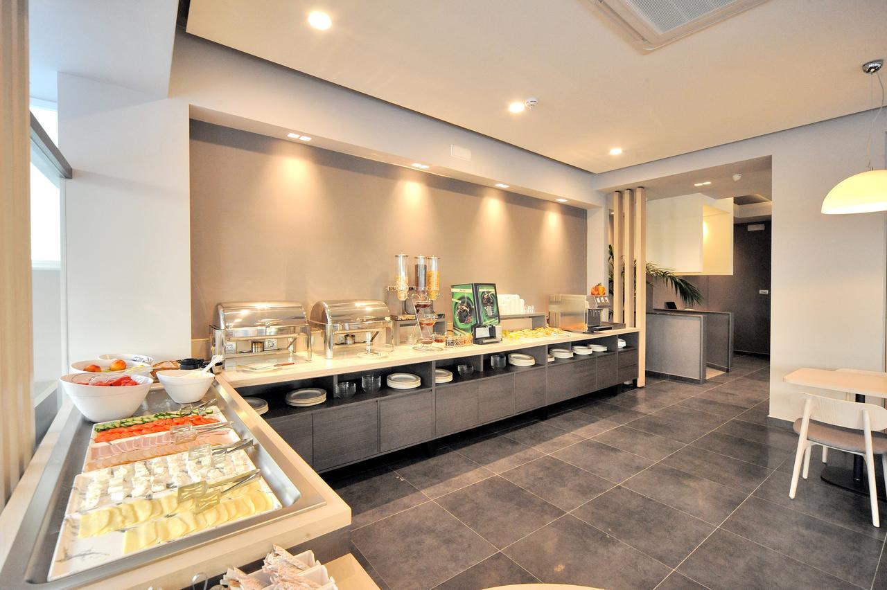 Astron Suites&Apartments Cos Exterior foto